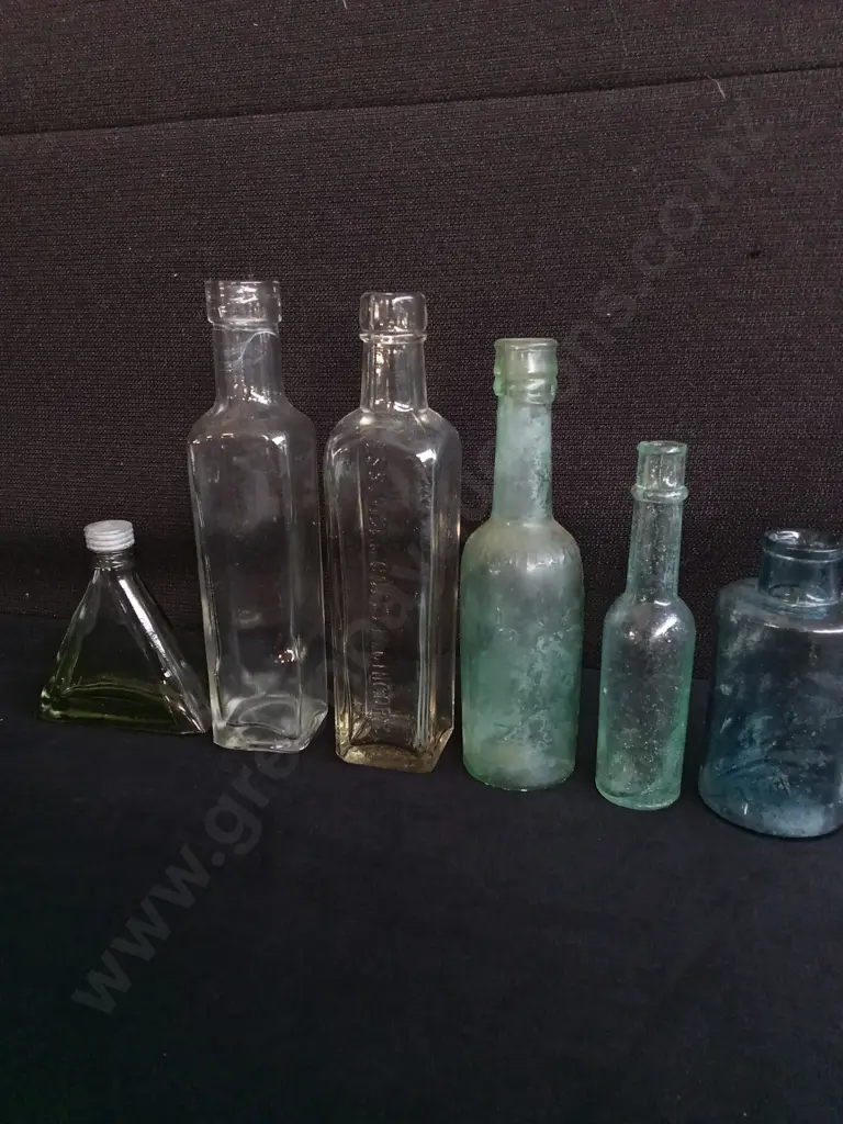 COLLECTION OF 10 VINTAGE AND ANTIQUE GLASS BOTTLES, INCLUDING MEDICINE, SODA, AND APOTHECARY BOTTLES Image 1++
