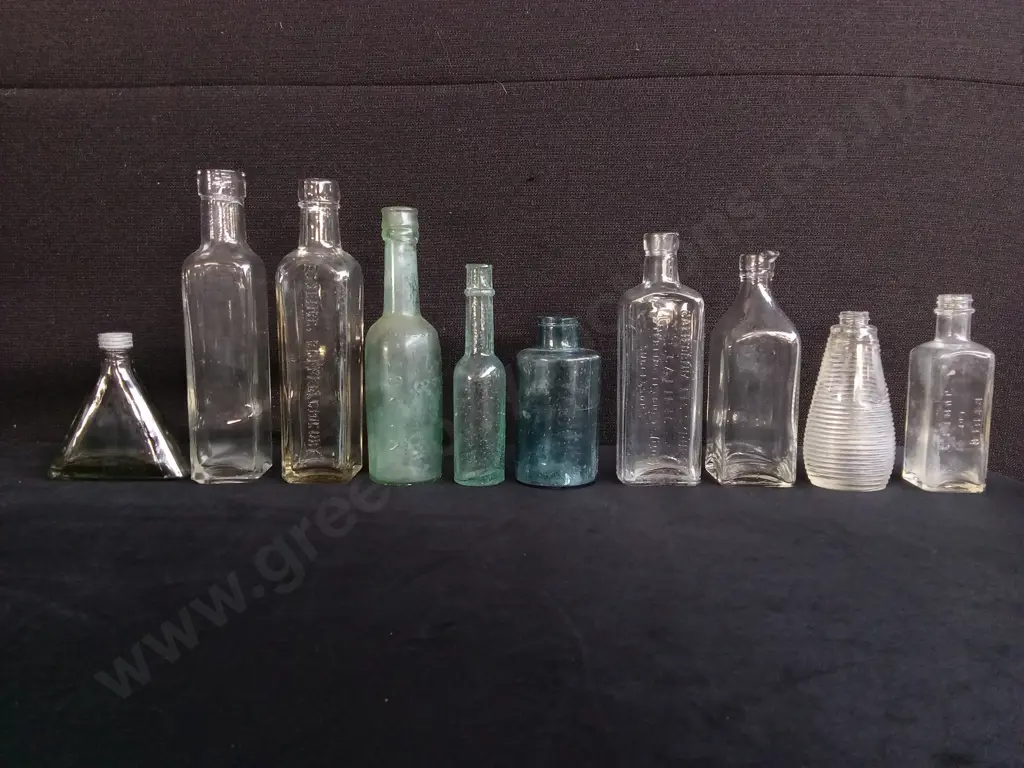 COLLECTION OF 10 VINTAGE AND ANTIQUE GLASS BOTTLES, INCLUDING MEDICINE, SODA, AND APOTHECARY BOTTLES Image 1++