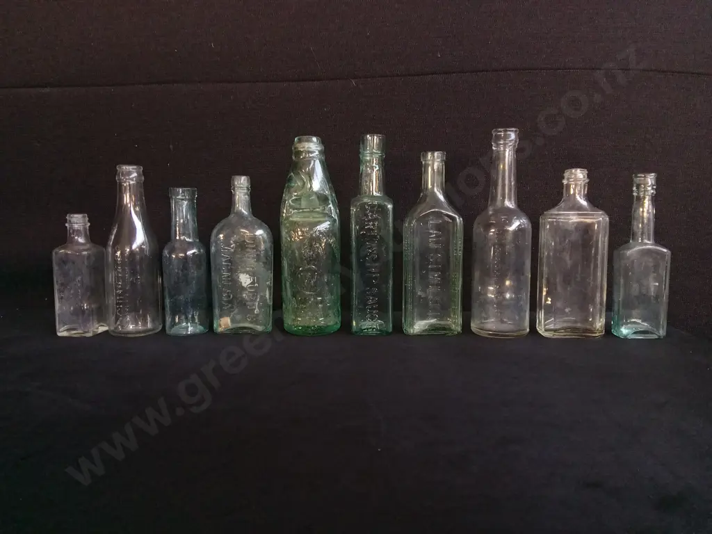 COLLECTION OF 10 VINTAGE AND ANTIQUE GLASS BOTTLES, INCLUDING SAUCE AND MEDICINE BOTTLES Image 1++