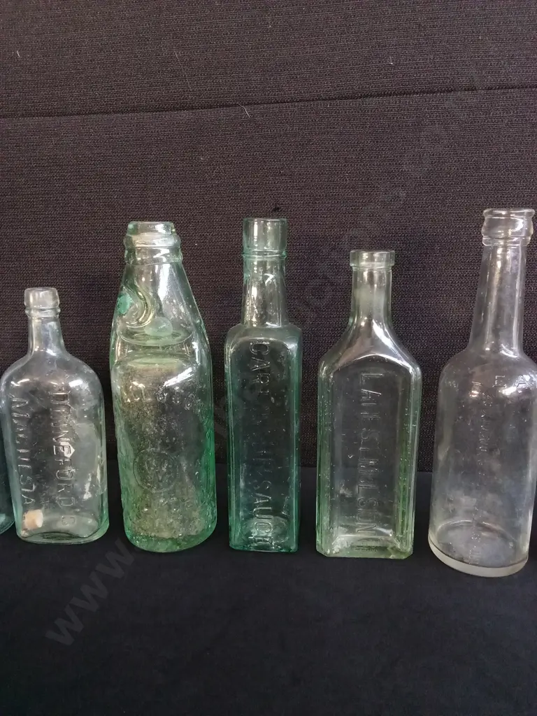 COLLECTION OF 10 VINTAGE AND ANTIQUE GLASS BOTTLES, INCLUDING SAUCE AND MEDICINE BOTTLES Image 1++