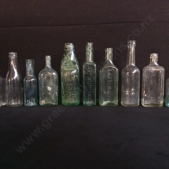 COLLECTION OF 10 VINTAGE AND ANTIQUE GLASS BOTTLES, INCLUDING SAUCE AND MEDICINE BOTTLES