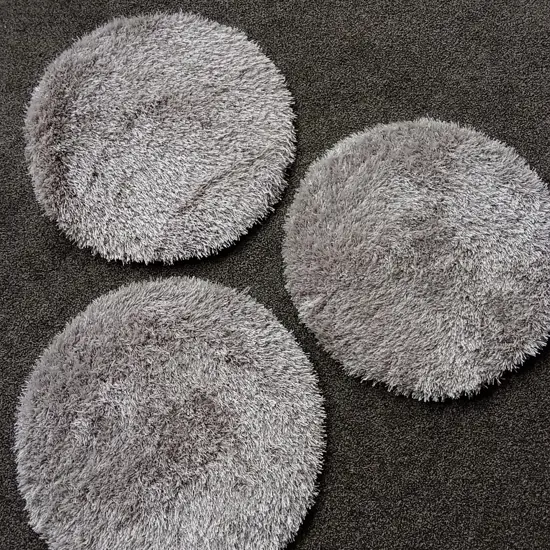 3 GREY SHAGGY CIRCULAR RUGS, 64 CM DIAMETER EACH