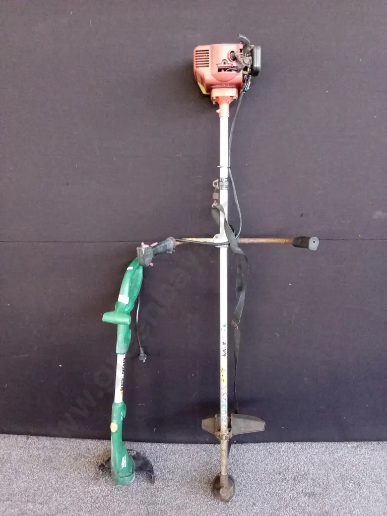 KAWASAKI PETROL LINE TRIMMER, MOTOR HAS COMPRESSION PLUS BLACK AND DECKER CORDED STRIMMER Image 1++
