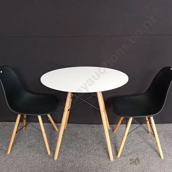 3 PIECE DINING SET FEATURING A WHITE ROUND TABLE AND 2 TWO BLACK PLASTIC CHAIRS WITH WOODEN LEGS
