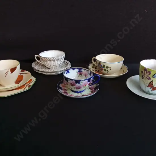 COLLECTION OF VINTAGE TEA CUP AND SAUCERS SET