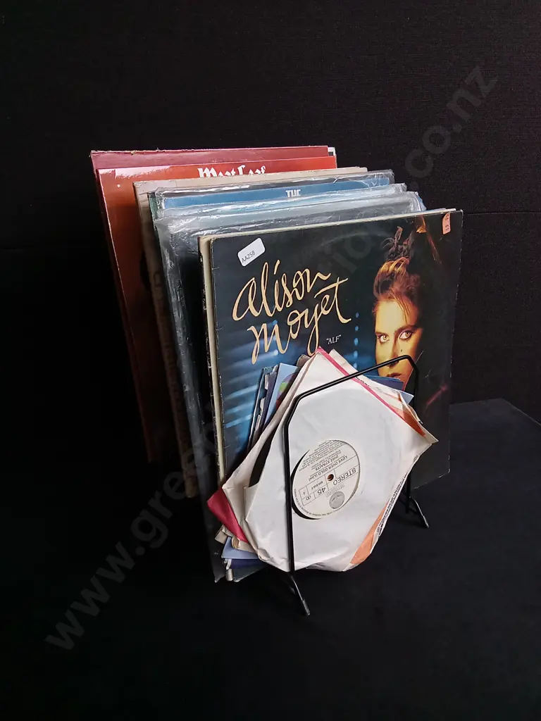 COLLECTION OF VINTAGE RECORDS, INCLUDING WIRE STAND Image 1++