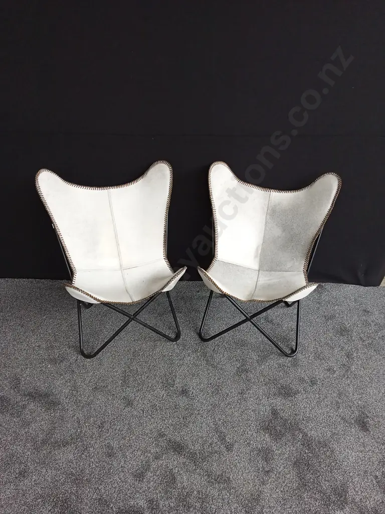 PAIR OF COW HIDE BUTTERFLY STYLE STEEL FRAMED CHAIRS Image 1++