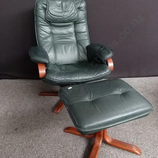 DARK GREEN LEATHER SWIVEL AND MATCHING OTTOMAN, TALLEST H 99 CM