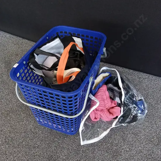 BASKET OF DOG PRODUCTS AND CLOTHES