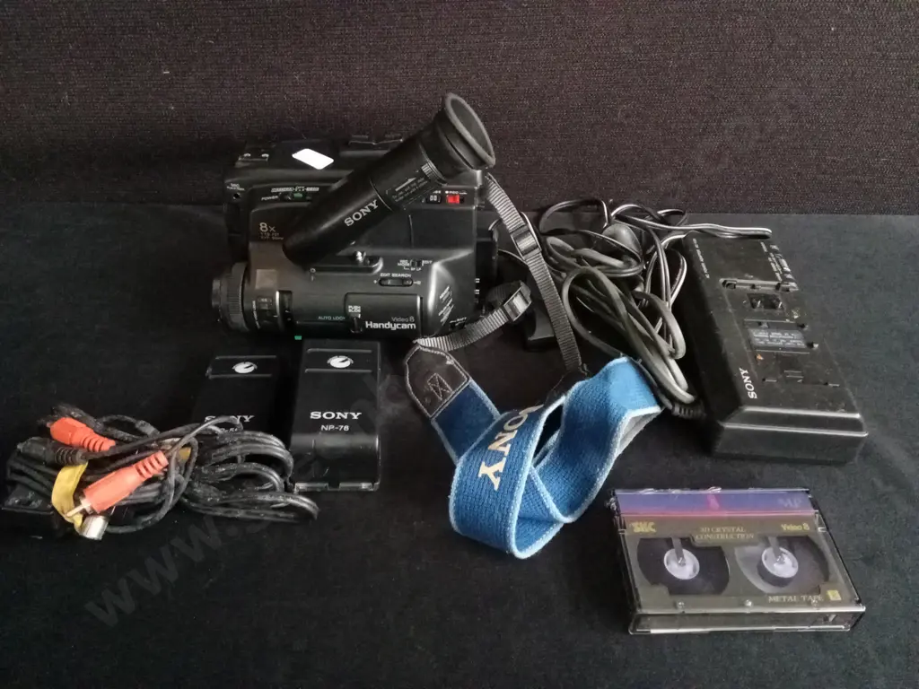 VINTAGE SONY HANDYCAM VIDEO8 CAMCORDER KIT, INCLUDING BATTERIES, CHARGER, CASSETTE TAPE, AND CASE Image 1++