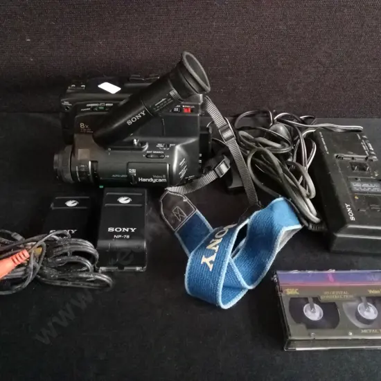 VINTAGE SONY HANDYCAM VIDEO8 CAMCORDER KIT, INCLUDING BATTERIES, CHARGER, CASSETTE TAPE, AND CASE