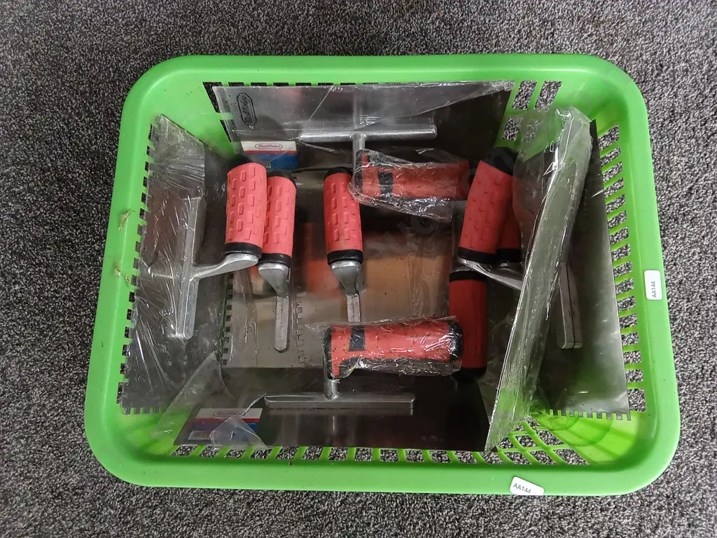 BASKET OF PLASTER TROWELS Image 1++