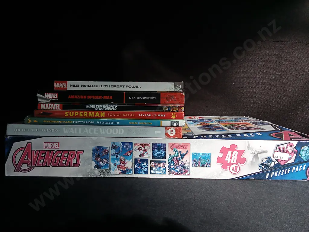 COLLECTION OF SUPERHERO BOOKS AND PUZZLE PACK Image 1++