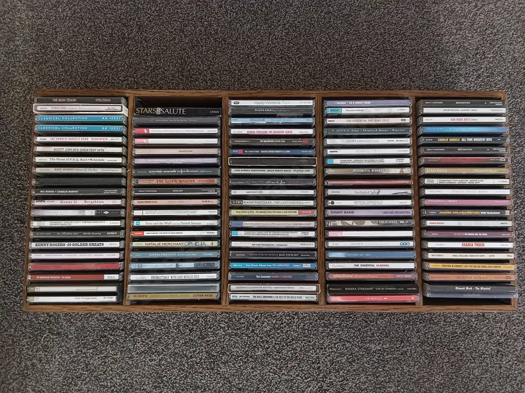 MIX OF CDS IN WOODEN ORGANISER Image 1++