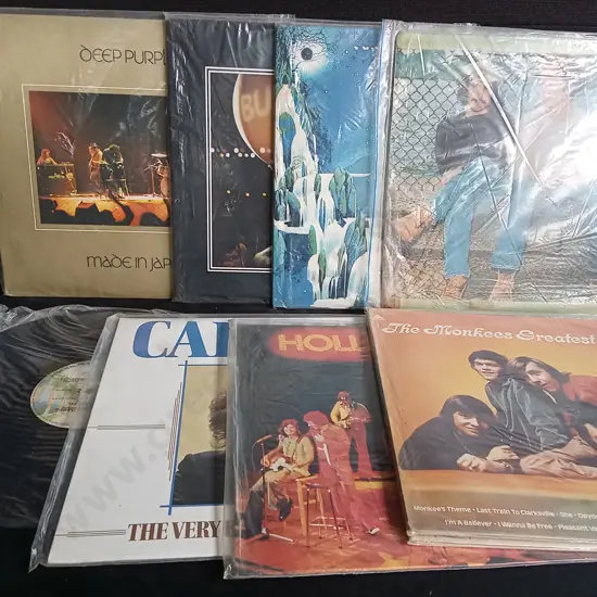 8 VINYL RECORDS