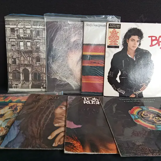 8 VINYL RECORDS