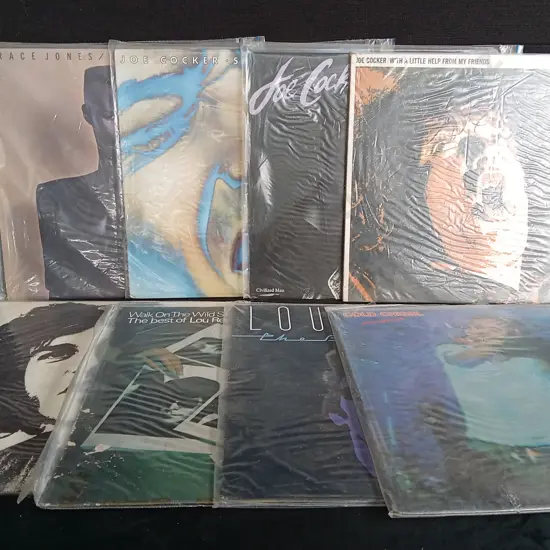 8 VINYL RECORDS