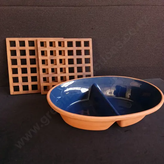 PAIR OF TEAK WOOD TRIVETS AND TERRACOTTA DIVIDED DISH, LARGEST W 33 CM