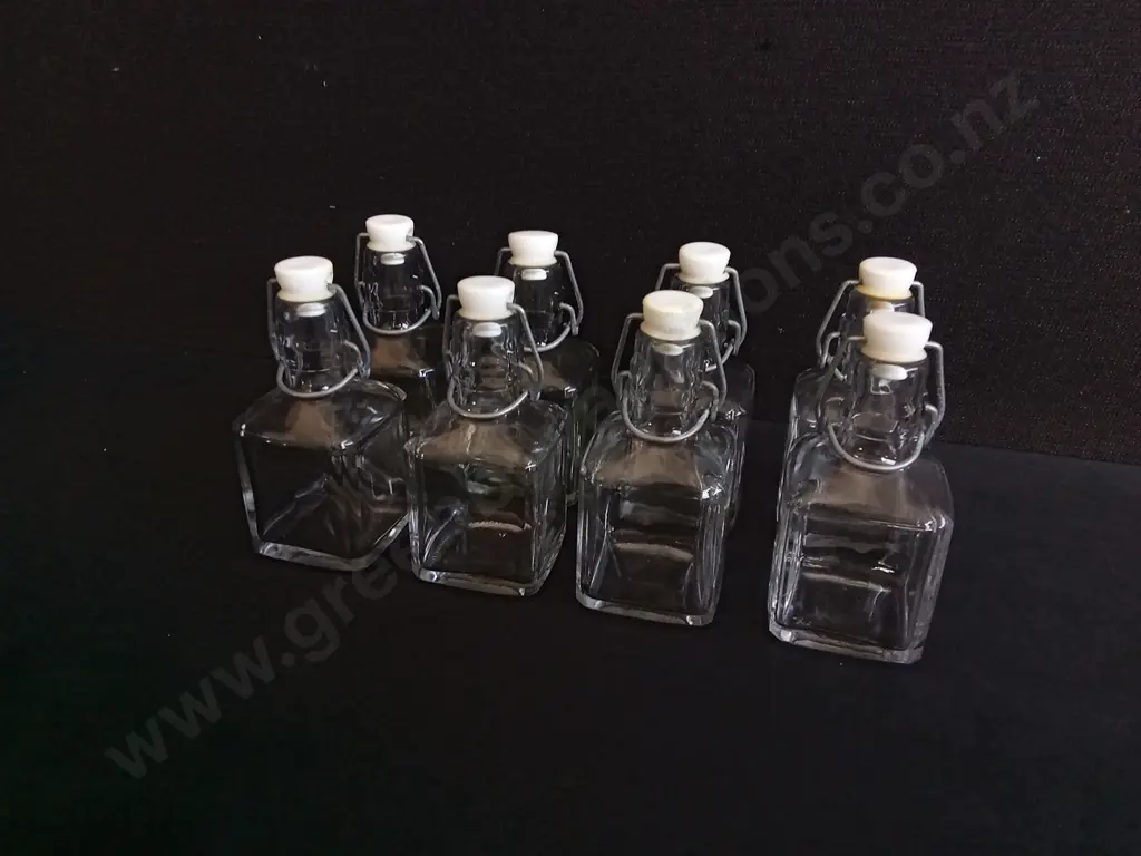 SET OF 8 GLASS BOTTLES WITH SWING TOP CLOSURES, H 14 CM Image 1++