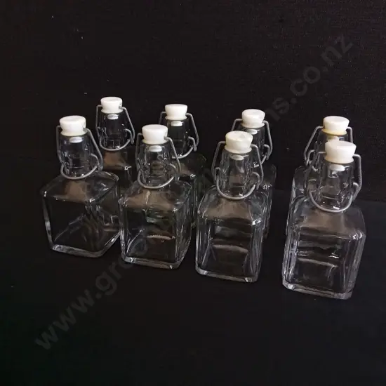 SET OF 8 GLASS BOTTLES WITH SWING TOP CLOSURES, H 14 CM
