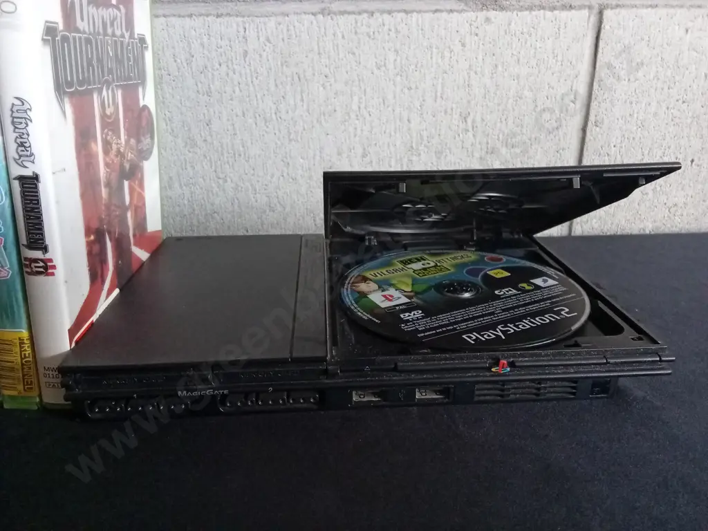 PLAYSTATION 2 SLIM, WITH COLLECTION OF GAMES INCLUDING SOME XBOX360 GAMES Image 1++