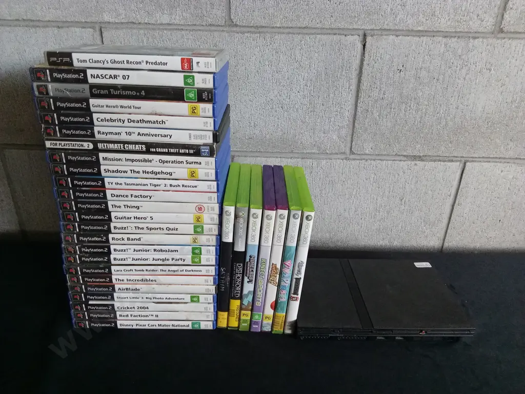 PLAYSTATION 2 SLIM, WITH COLLECTION OF GAMES INCLUDING SOME XBOX360 GAMES Image 1++