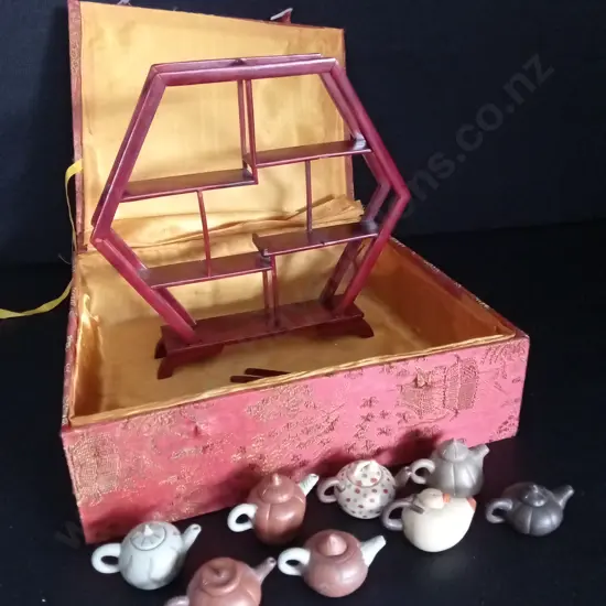 HEXAGONAL WOODEN SHELF H26CM , 2 BROKEN PIECES, WITH 8 MINIATURE TEA POTS TALLEST H3CM