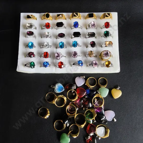MIX OF RINGS AND PENDANTS