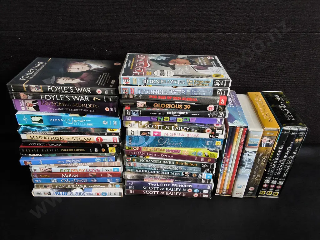 MIX OF DVDS, INCLUDING BOX SETS Image 1++