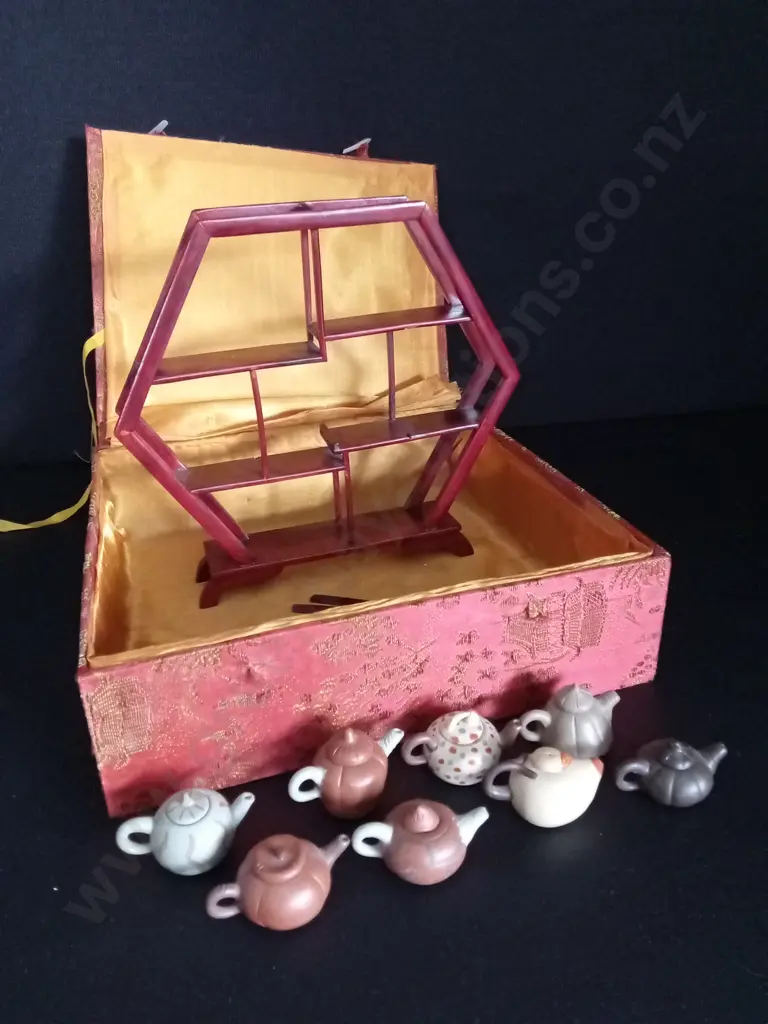 HEXAGONAL WOODEN SHELF H26CM , 2 BROKEN PIECES, WITH 8 MINIATURE TEA POTS TALLEST H3CM Image 1++