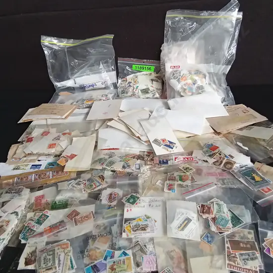 LARGE COLLECTION OF VINTAGE STAMPS FROM AROUND THE WORLD