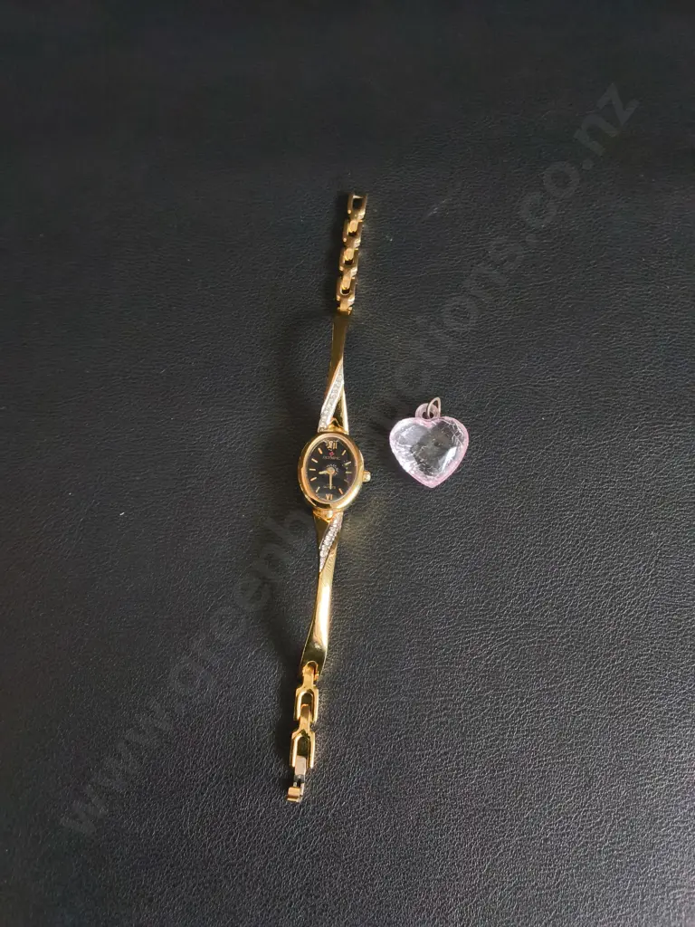 GOLD TONE OLYMPIC SWISS WATCH AND A HEART PENDANT Image 1++