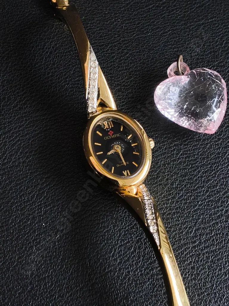 GOLD TONE OLYMPIC SWISS WATCH AND A HEART PENDANT Image 1++
