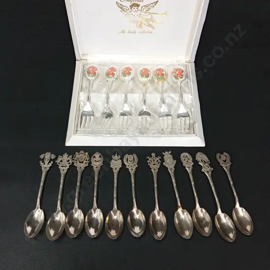 11 VINTAGE SOUVINER SPOONS AND 6 DESSERT SPOONS