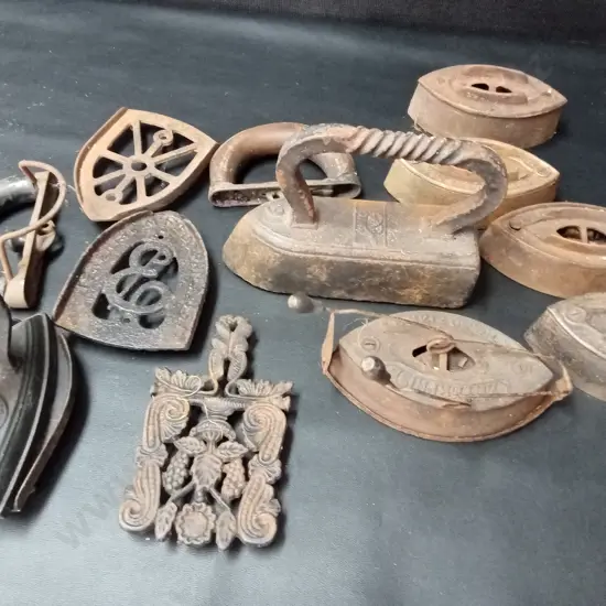 VINTAGE CAST IRON TRIVETS AND IRONS