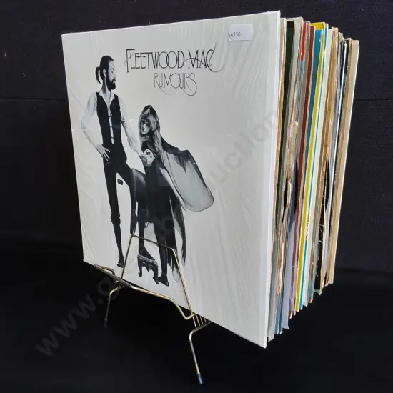 VINTAGE WIRE RECORD STAND AND MIX OF VINYL, INCLUDES 20 RECORDS