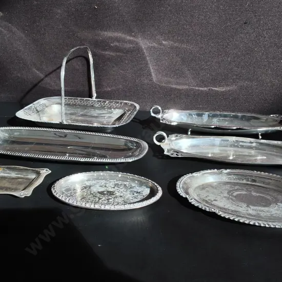 VINTAGE SILVER PLATED SERVING ITEMS, 7 TRAYS, PLATTERS AND BRIDE'S BASKET, WIDEST W 36 CM
