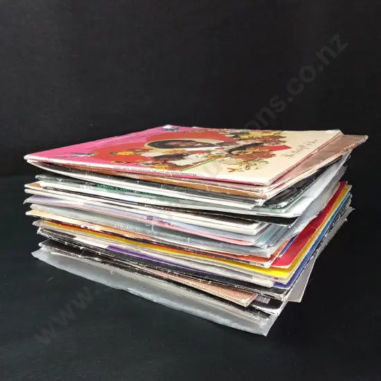 STACK OF VINYL RECORDS
