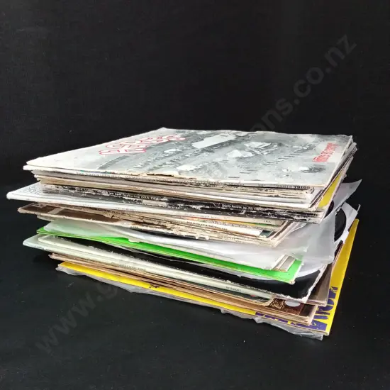 STACK OF VINYL RECORDS