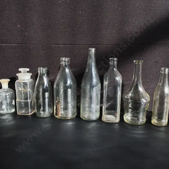 COLLECTION OF 10 VINTAGE CLEAR GLASS BOTTLES, TALLEST H 30 CM