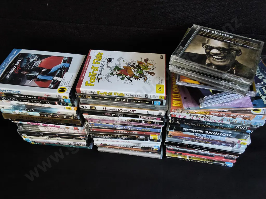 COLLECTION OF DVDS AND CDS Image 1++