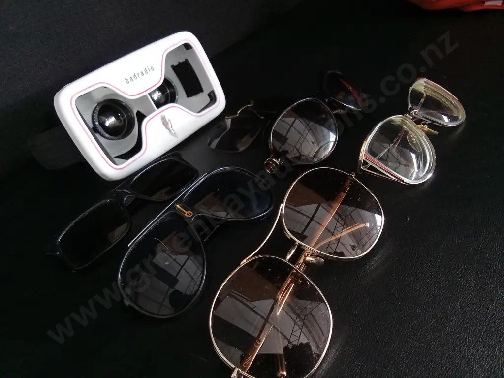 COLLECTION OF SUNGLASSES INCLUDING PHONE BASED VR HEADSET. Image 1++