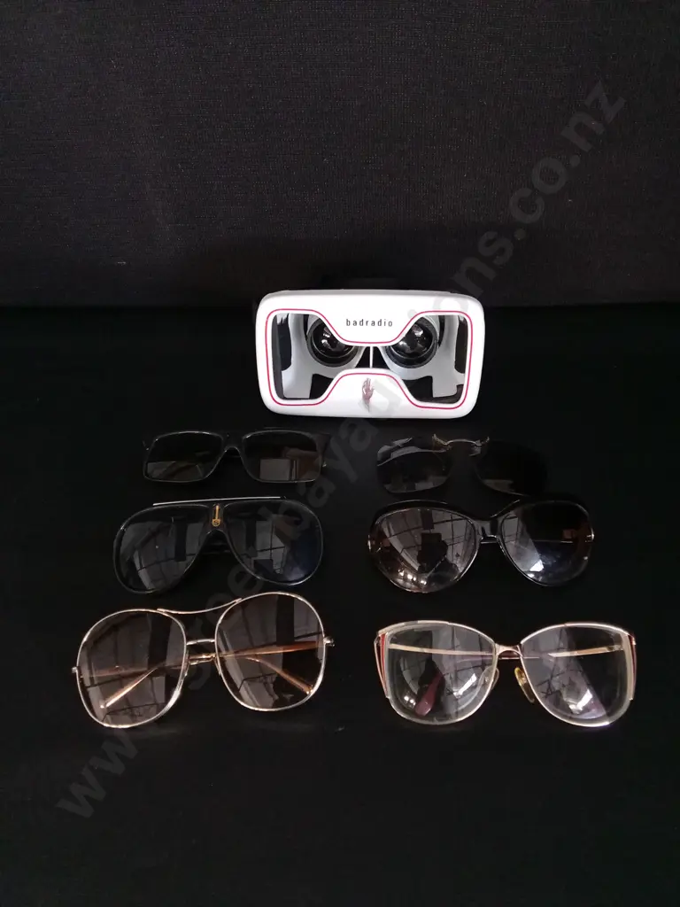 COLLECTION OF SUNGLASSES INCLUDING PHONE BASED VR HEADSET. Image 1++
