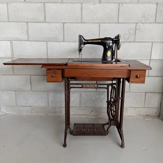 VINTAGE SINGER TREADLE SEWING MACHINE IN WOODEN TABLE WITH CAST IRON BASE, HEIGHT IS 78CM