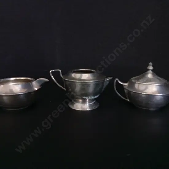 SET OF SILVER PLATED CREAMER AND TEAPOTS