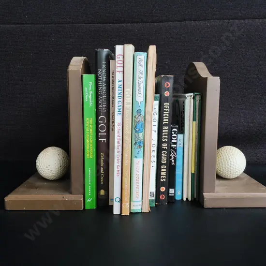 COLLECTION OF GOLF BOOKS AND PAIR OF BOOK ENDS