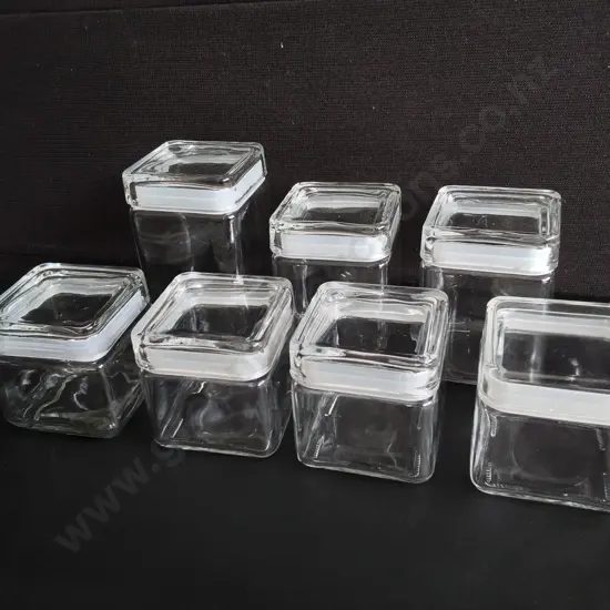 7 GLASS STORAGE CANISTERS WITH LIDS, TALLEST H 18.5 CM