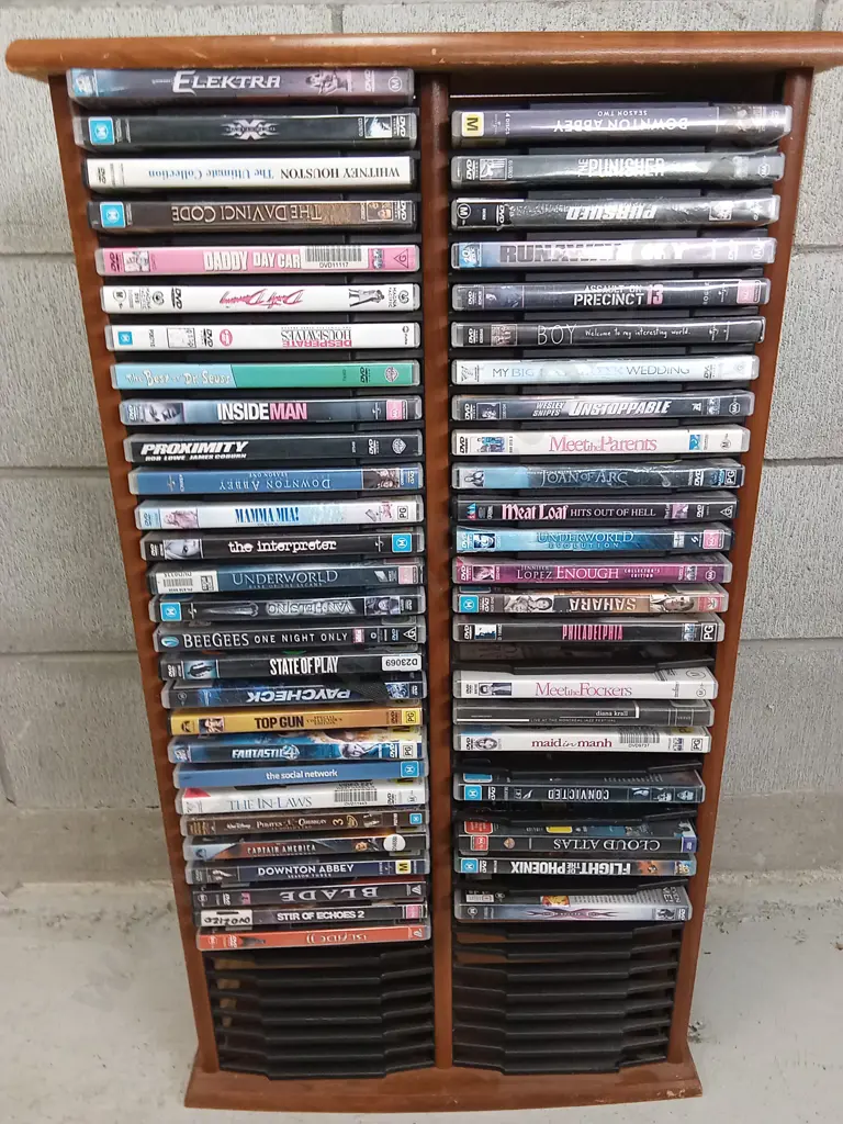 DVD STACK DISPLAY WITH CONTENTS, H 84CM X W 47CM D 14CM Image 1++