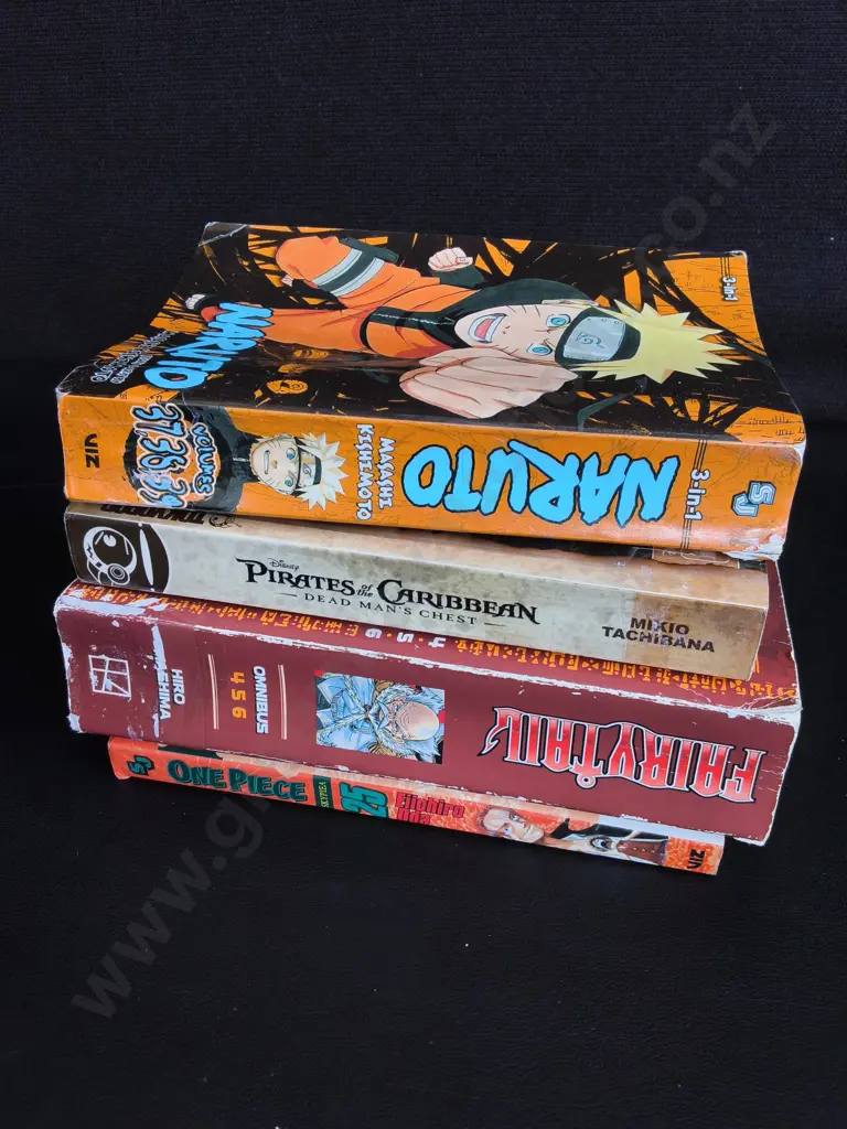 4 BOOKS AND MANGA VOLUMES Image 1++