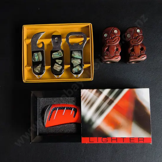PAIR OF CARVED WOODEN TIKI HEAD STOPPERS, BOTTLE OPENERS, AND BRAND NEW LIGHTER